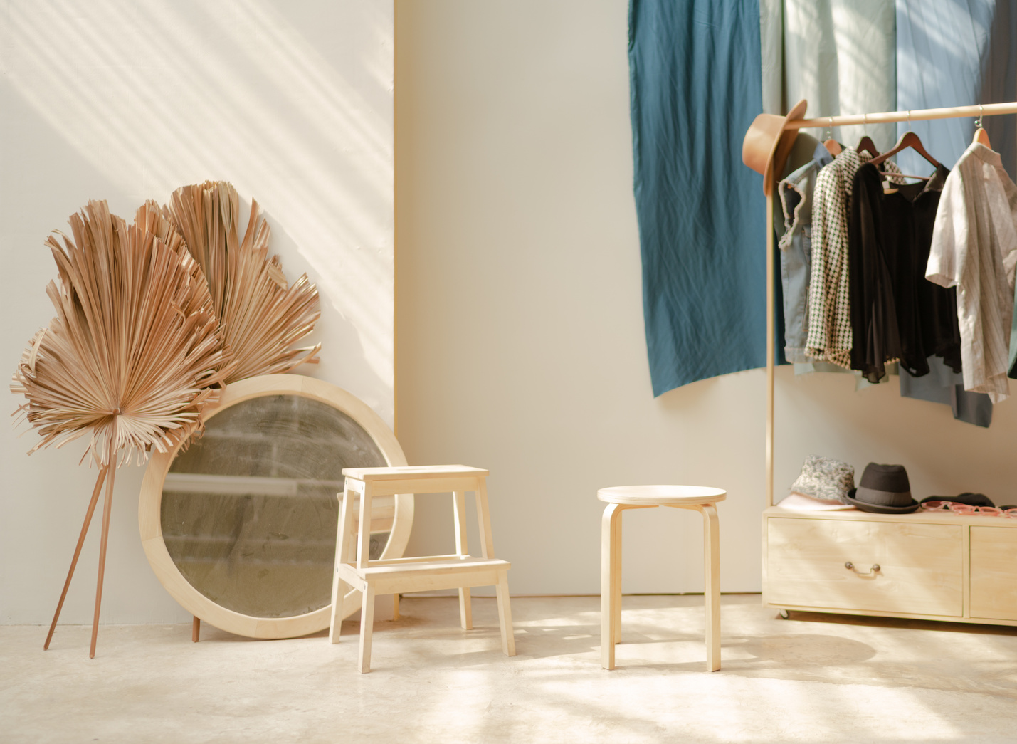 White Wooden Barstool and White Round White Mirror Frame